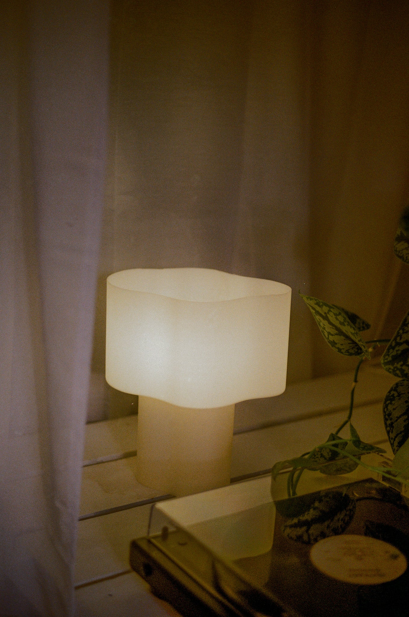 Cloudy Lamp Large, 3D-printed from bio-based PLA filament mixed with scallop shell powder. Sustainable and eco-friendly design featuring a layered texture that captures and reflects light beautifully.