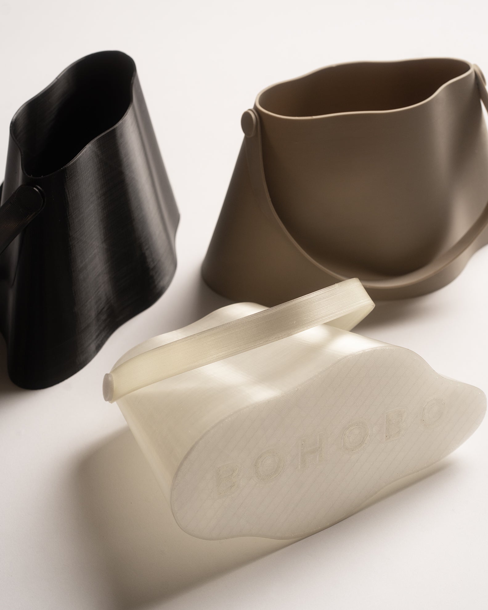 Shell Midi Bag, fully 3D-printed from recycled TPU and biodegradable materials. Unique, edgy design with layered texture, combining sustainability and eco-conscious craftsmanship.