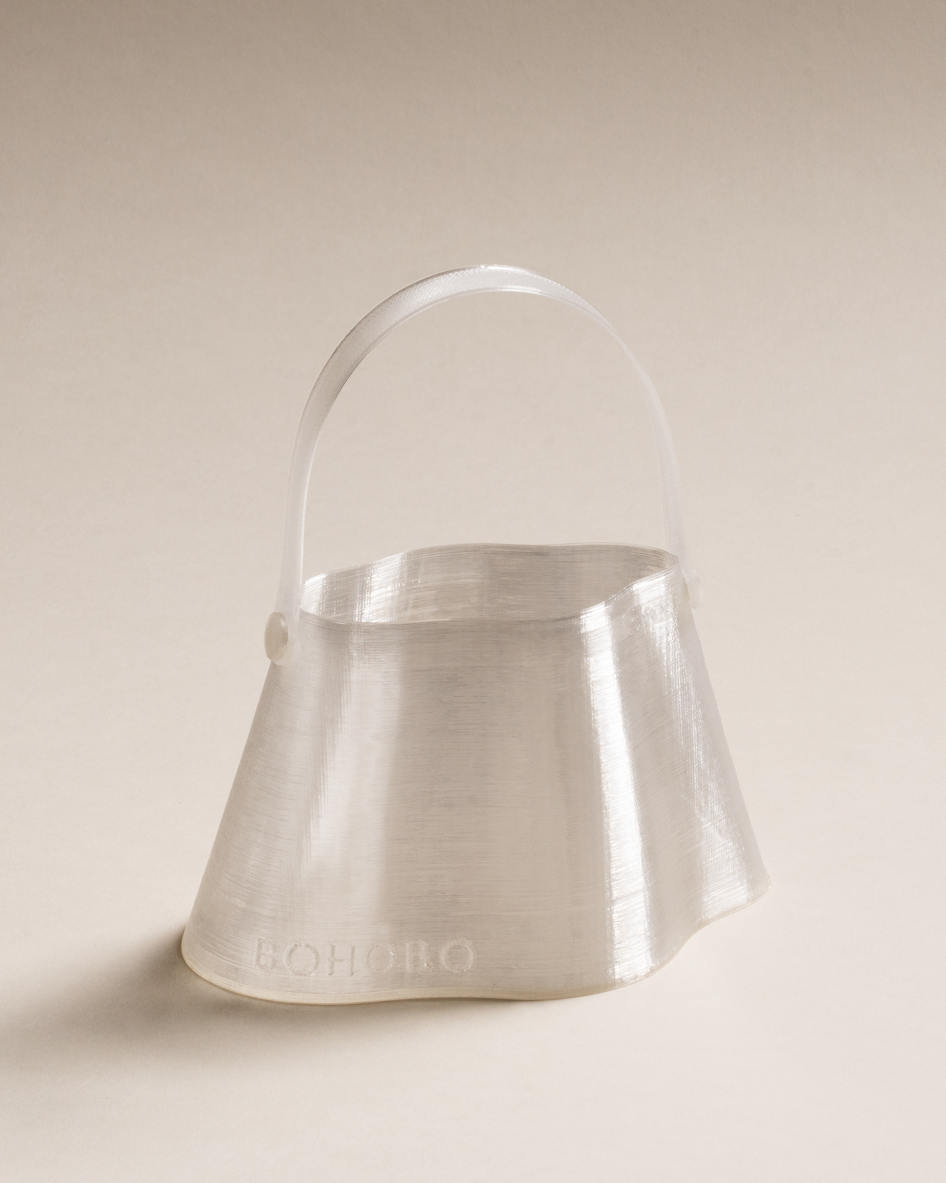 Shell Mini Bag, fully 3D-printed from recycled transparent TPU. Unique layered design, compact yet striking, combining sustainability and innovative craftsmanship.