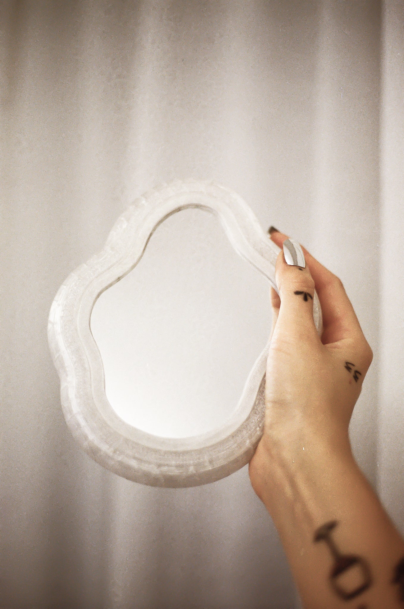 Blob Mirror, 3D-printed from eco-friendly PLA filaments mixed with natural by-products like oyster, mussel, scallop shells and wheat offcuts. Unique organic shape, versatile as a hand mirror or chic tray, with sustainable, non-toxic craftsmanship.